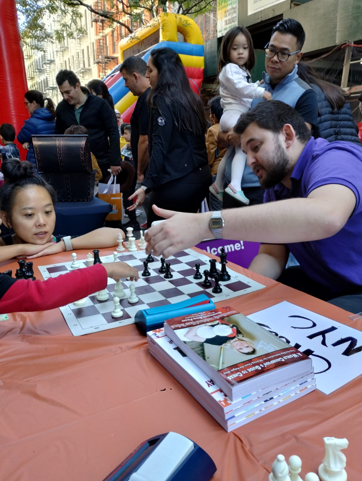 Chess NYC community members playing chess together